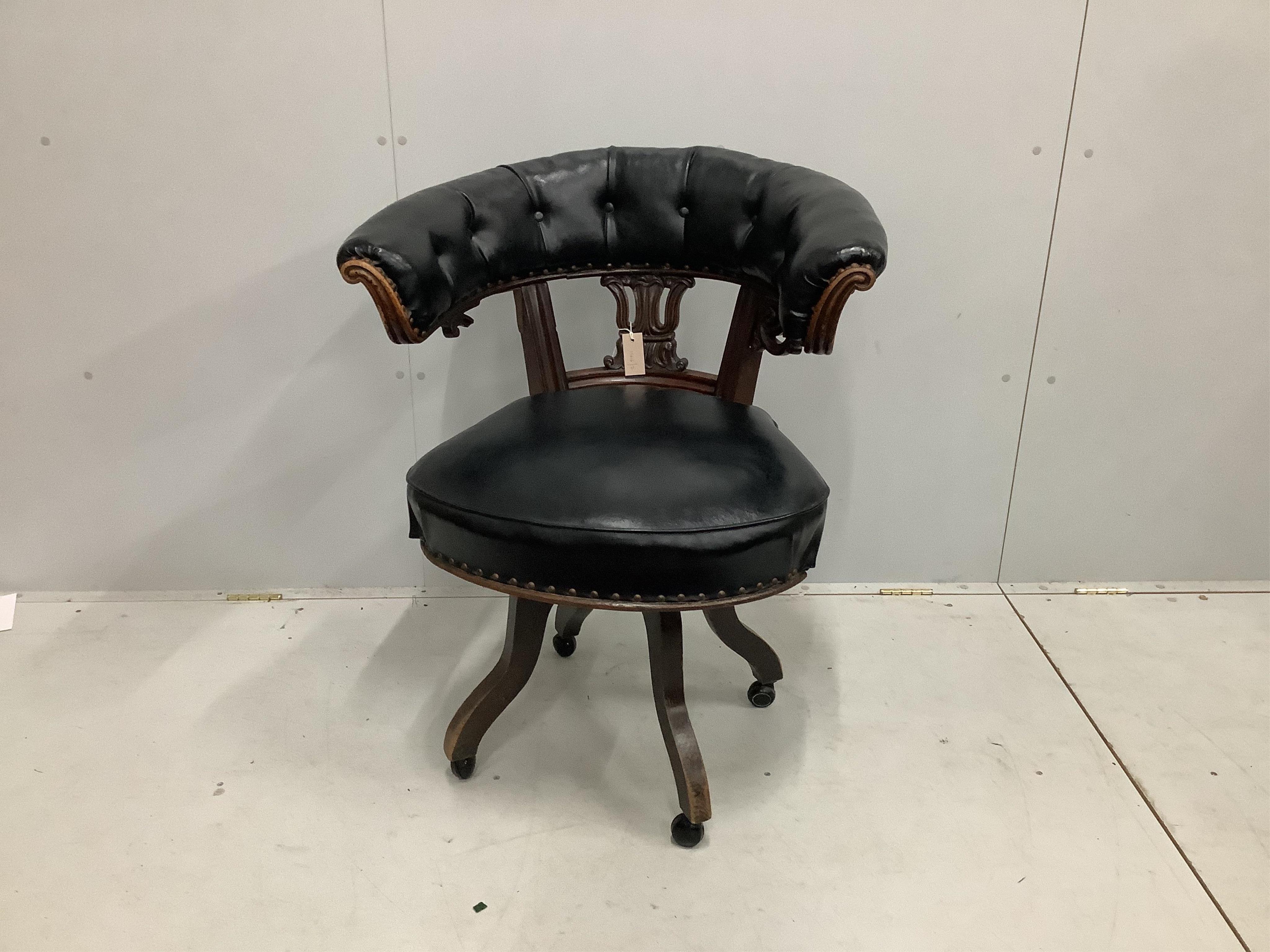 A Victorian mahogany swivel desk chair, width 73cm, depth 53cm, height 92cm. Condition - fair